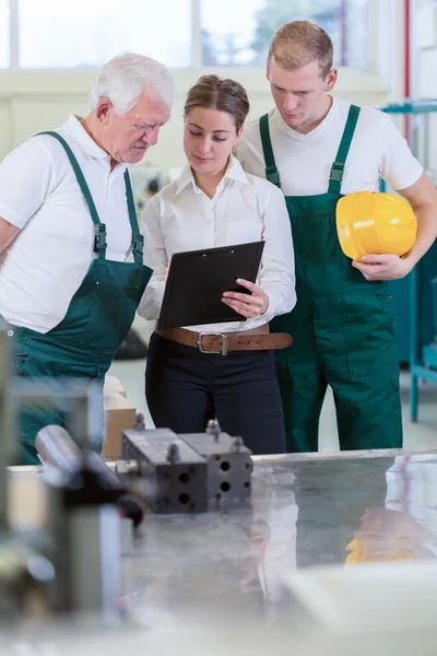 Checking the plan — Stock Photo, Image