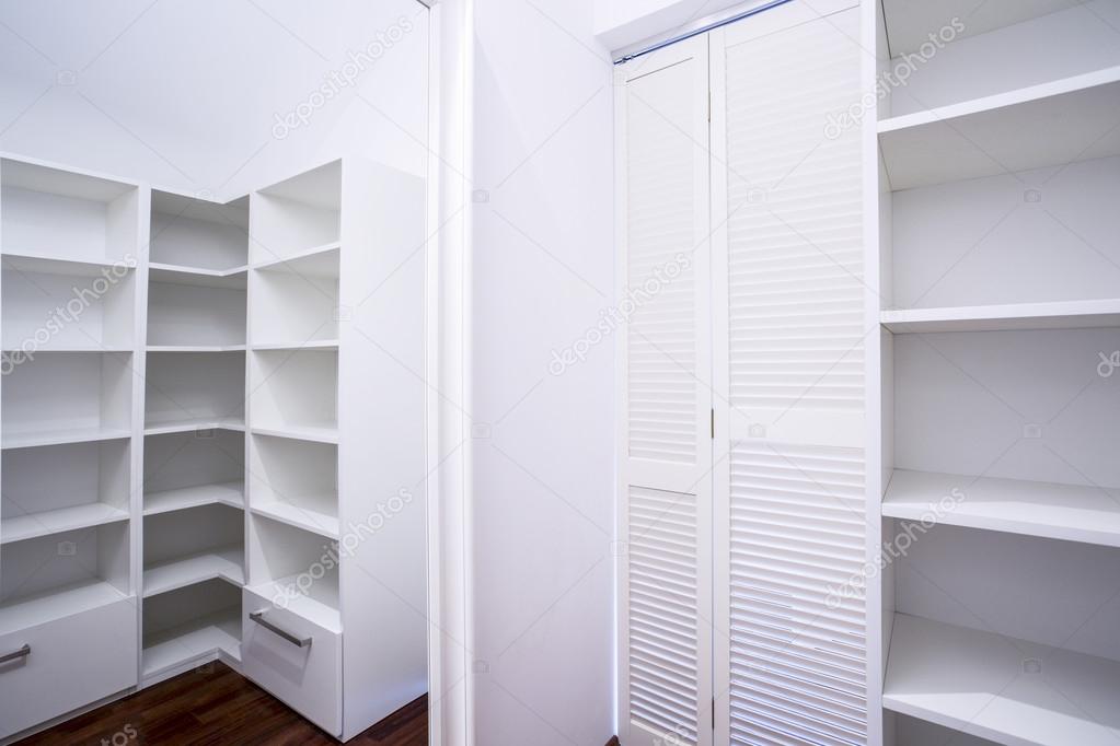 Empty white wardrobe area 