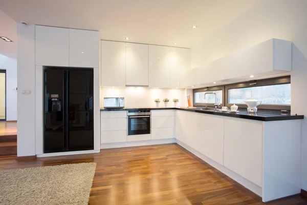Keuken met terracotta vloer tegels — stockfoto © lmphot #8670307 Met woonkamer