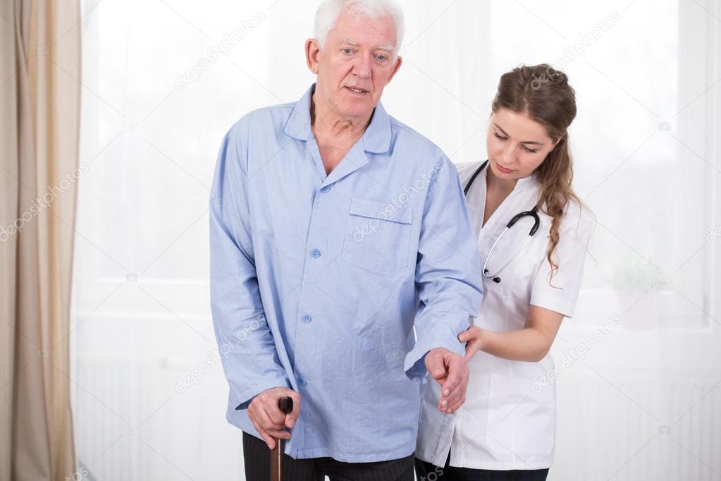 Patient using walking stick