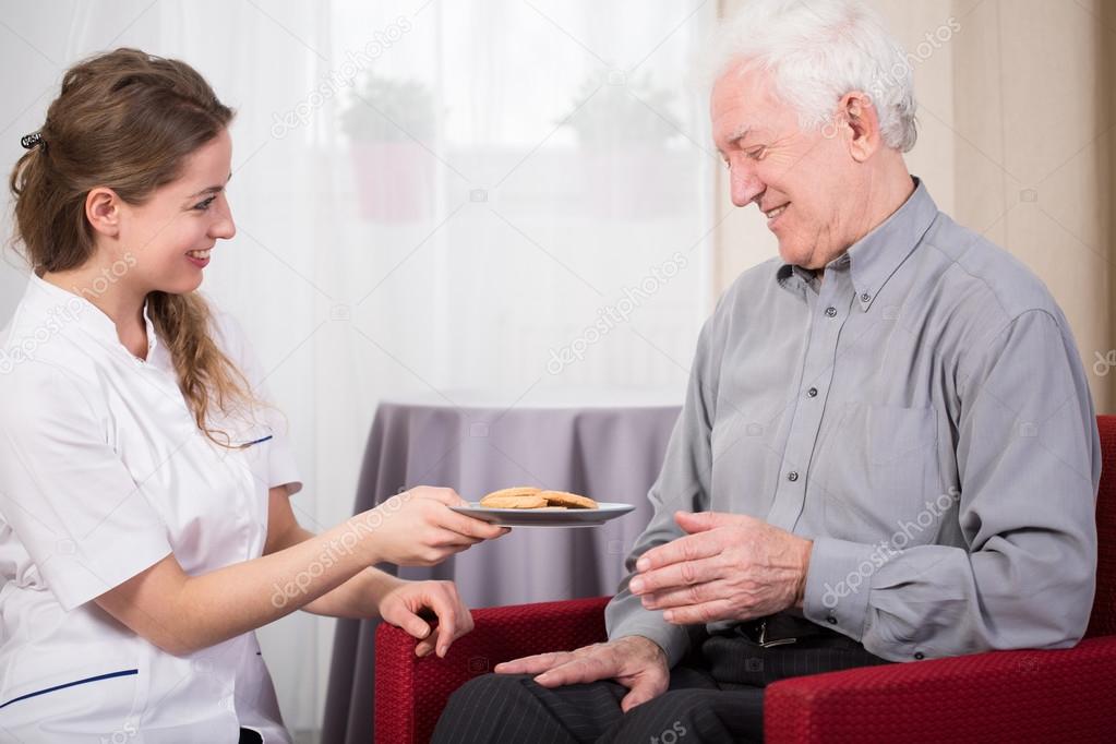 Care assistant and retired man