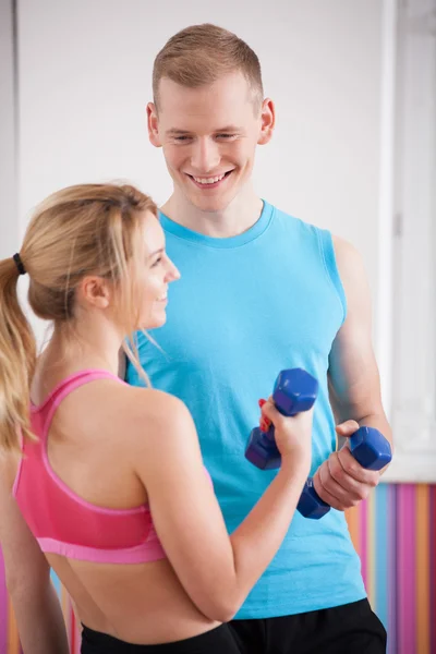 Couple with dumbbells — Stock Photo, Image