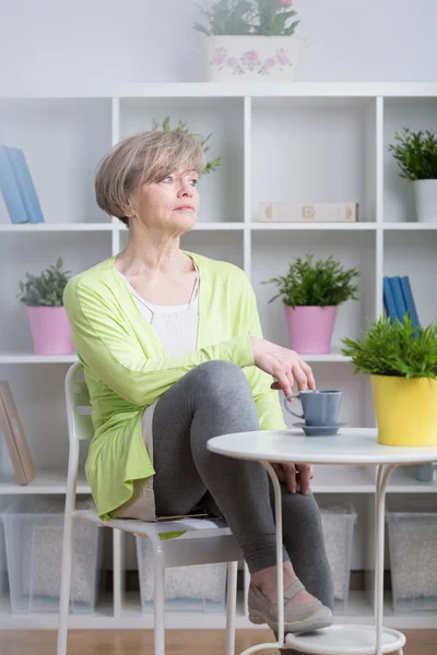 Thoughtful middle aged woman — Stock Photo, Image