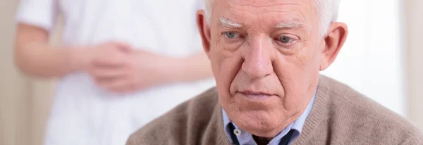 Portrait of sad retiree — Stock Photo, Image