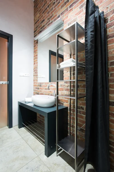 Brick wall in contemporary toilet — Stock Photo, Image