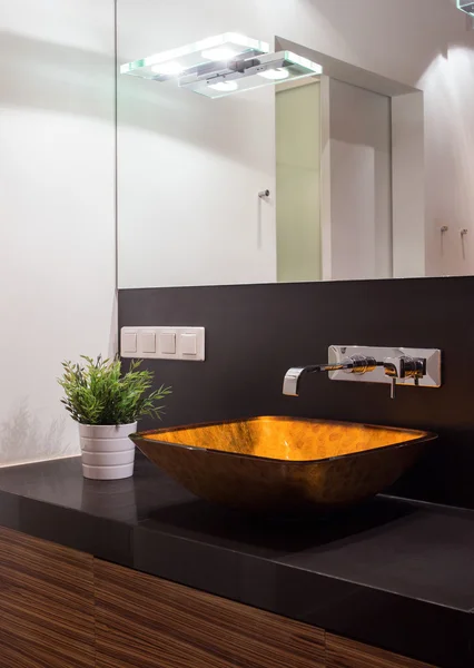 Illuminated washbasin in modern toilet — Stock Photo, Image