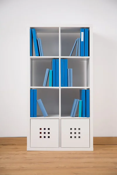 White bookcase in teen bedroom — Stock Photo, Image