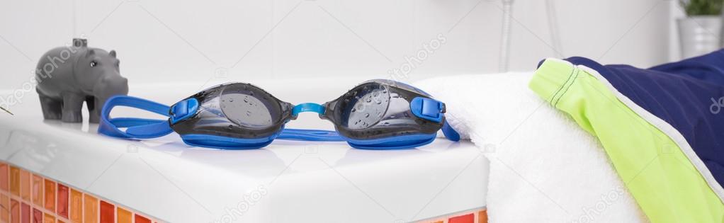 Swimming glasses on bath