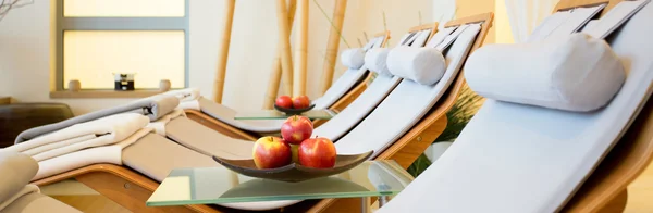 Wooden fancy loungers in spa — Stock Photo, Image