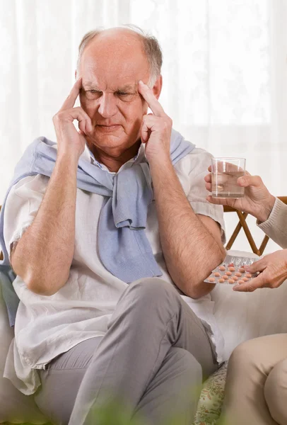 Man having pain in temples — Stock Photo, Image