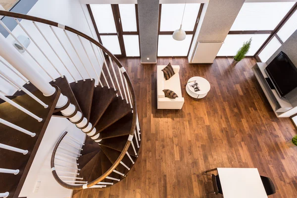 Curve stairs in spacious living room — Stock Photo, Image