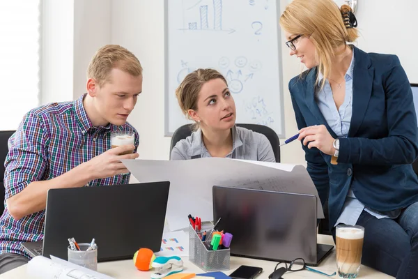 Office workers talking