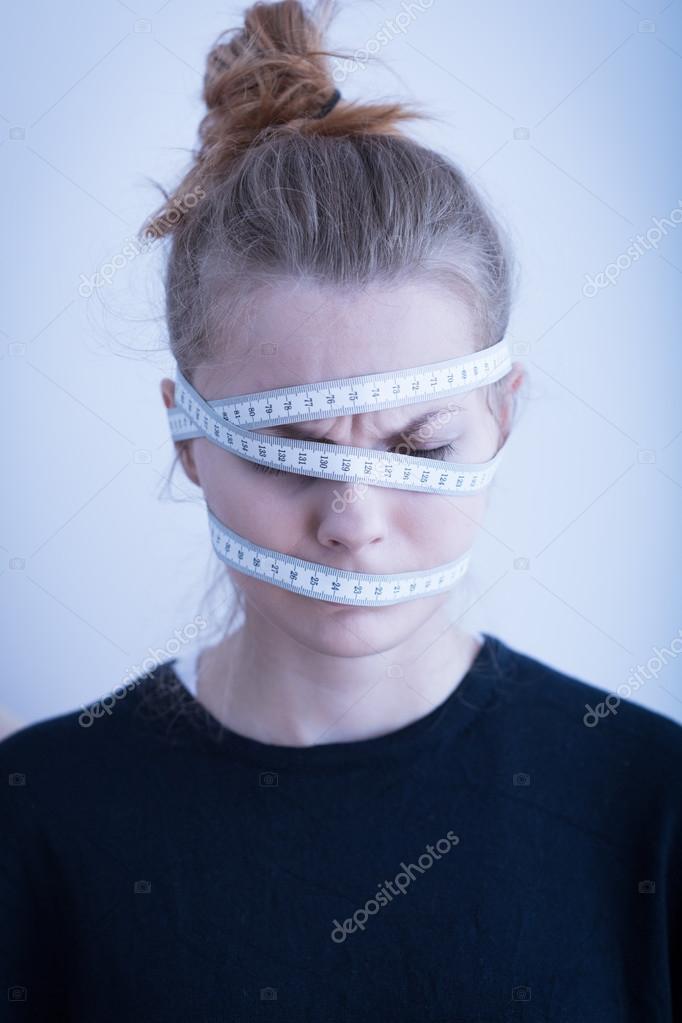 Tape wrapped around the head Stock Photo by ©photographee.eu 73400009