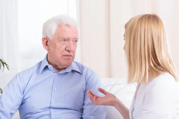 Older man and nurse — Stock Photo, Image