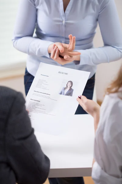 Employers looking at a resume — Stock Photo, Image