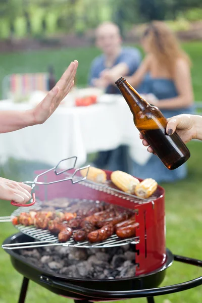 Person refusing beer — Stock Photo, Image