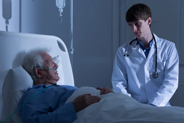 Caring doctor and man — Stock Photo, Image