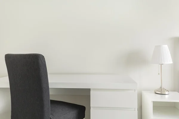 White desk and gray chair — Stock Photo, Image