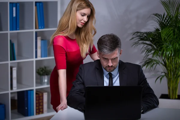 Sexy secretary seducing her boss — Stock Photo, Image