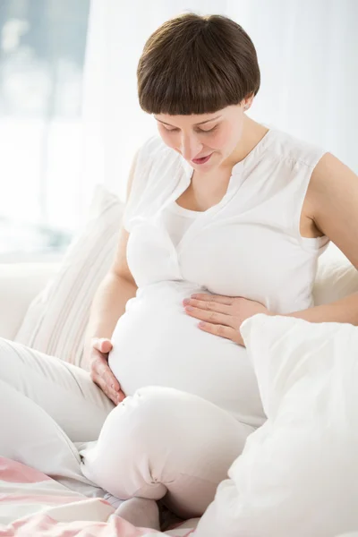 Looking at baby's ultrasound image — Stock Photo, Image