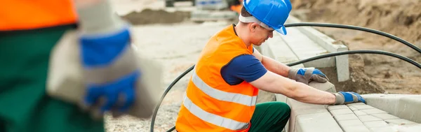 Placing the sett — Stock Photo, Image