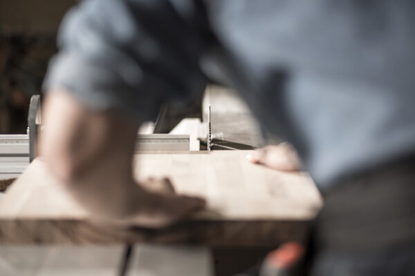 Carpenter working with wood