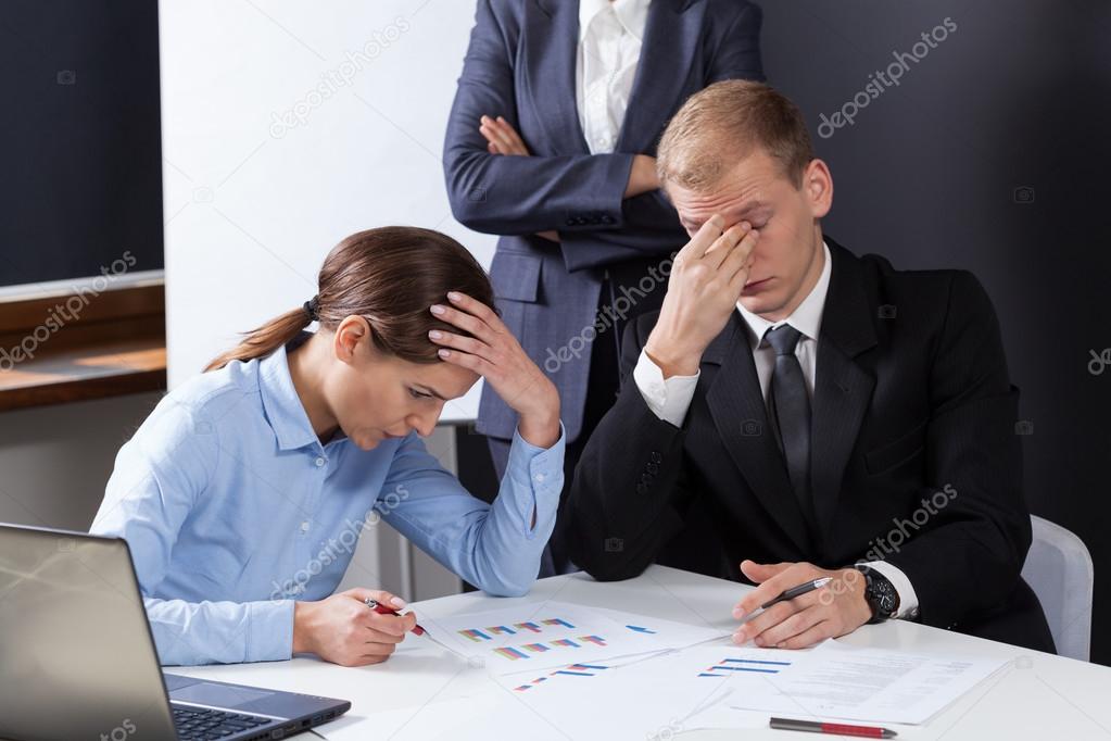 Tired employees during job