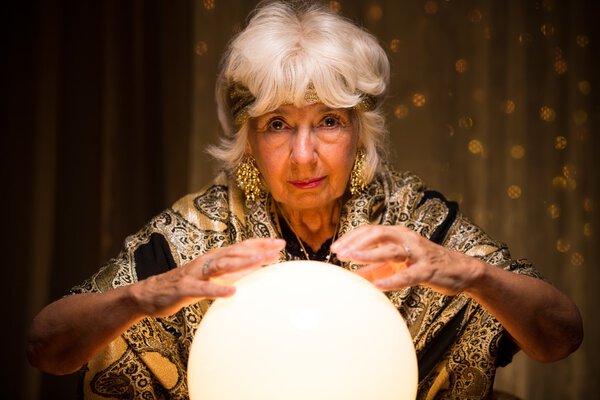 Mystique woman with magic ball