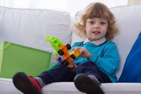 Boy on couch — Stock Photo, Image