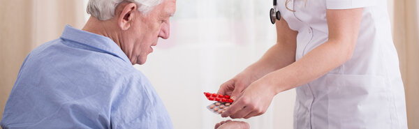 Elder man's treatment with pills