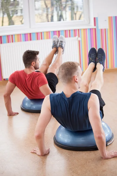 Men during balance training — Stock Photo, Image