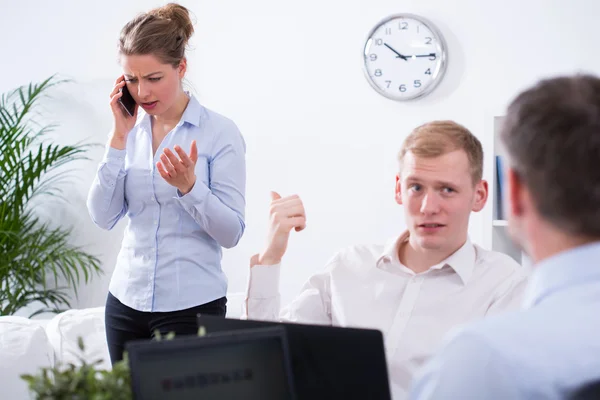 Businessman and annoying colleague — Stock Photo, Image