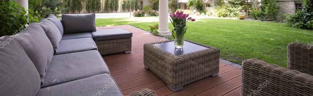Comfortable couch in the garden — Stock Image Comfortable couch in the garden Stock Image
