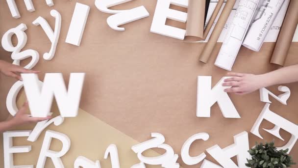 Work - people building word from letters — Stock Video