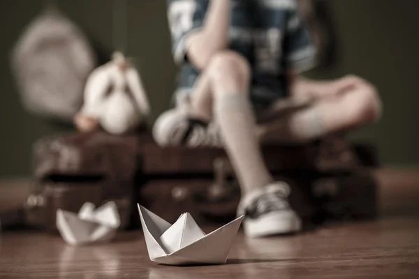 Paper boat on the floor — Stock Photo, Image