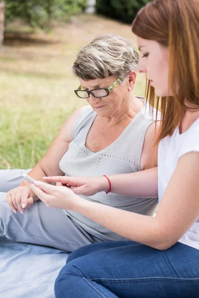 Girl and mature woman — Stock Photo, Image