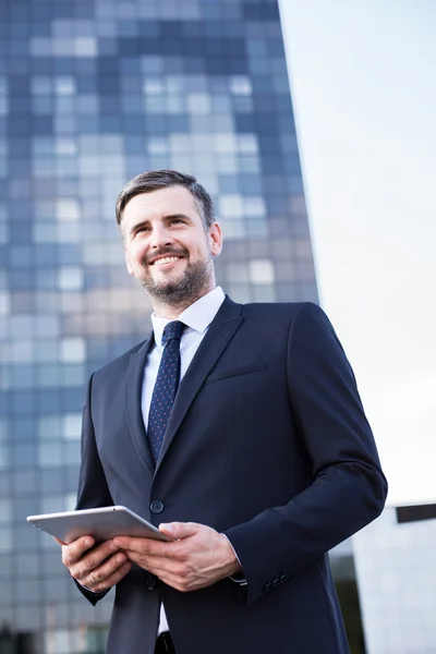 Handsome manager standing outside — Stock Photo, Image
