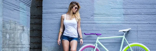 Sexy girl with bike — Stock Photo, Image