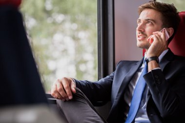 Business sınıfta seyahat eden yolcu