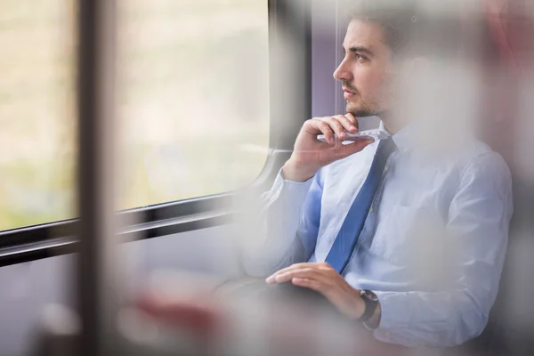 Businessman using commuter rail — Stock Photo, Image