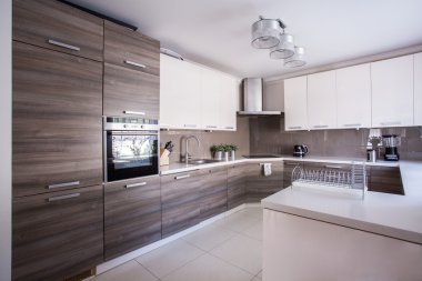 Kitchen furnished in modern design clipart