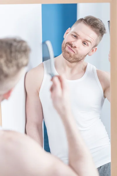 Guy with scowl on face — Stock Photo, Image