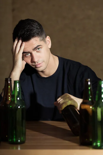 Addicted businessman with beers — Stock Photo, Image