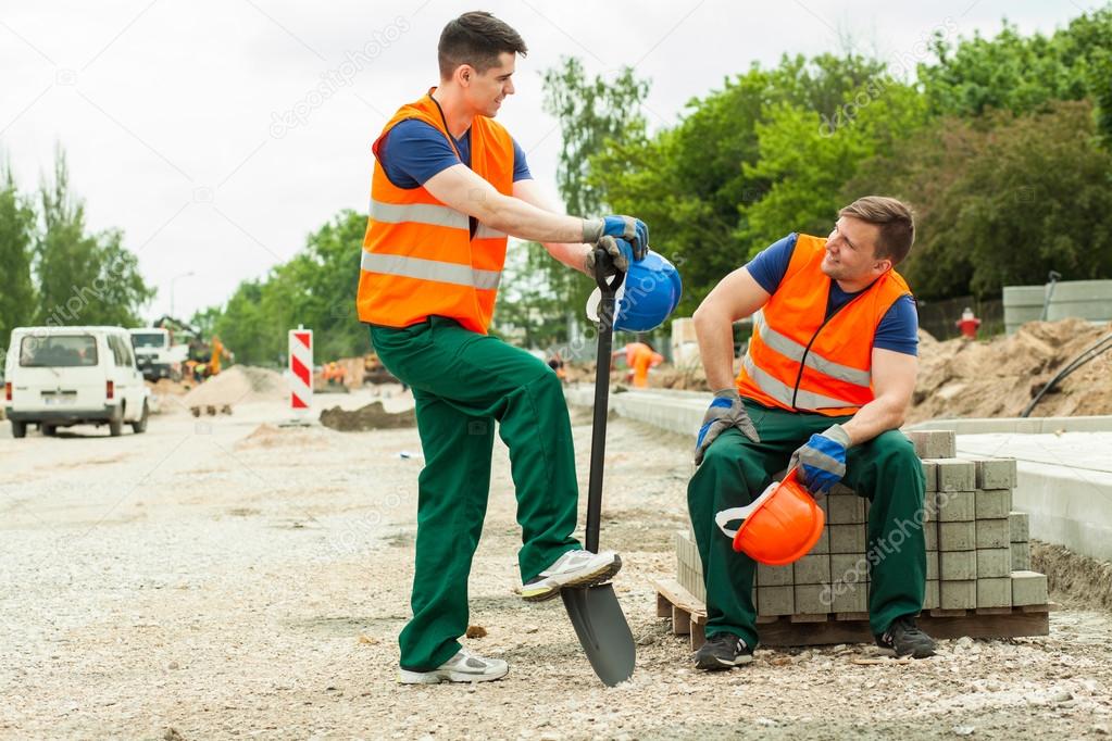 Construction workers having break