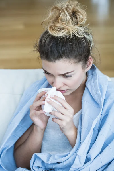 Feverish woman with tissue — Stock Photo, Image