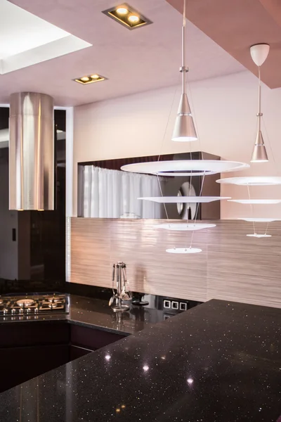 Black countertop in the kitchen — Stock Photo, Image