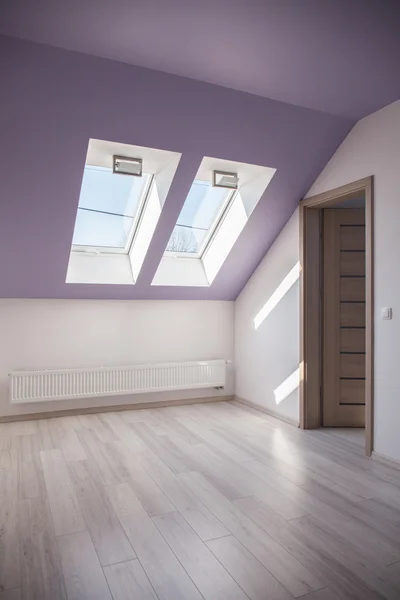 Spacious attic with floor panels — Stock Photo, Image