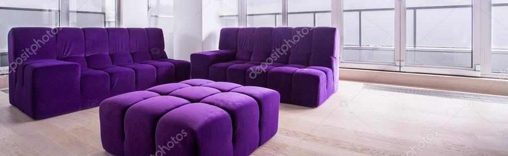 Bright lounge with purple furniture