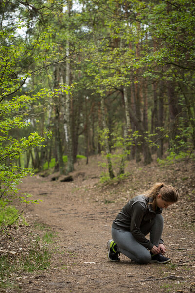 Girl training in the forest