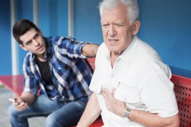 Retiree with chest pain clipart